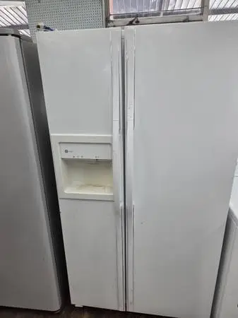 Ge side by side refrigerator whith ice and water has been tested works great in