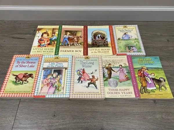 LITTLE HOUSE ON THE PRAIRIE 9 PAPERBACK BOOKS by Laura Ingalls Wilder