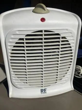 Fan/heater,110v,table/desk top,2 sp,7”,forced air,clean,quite.