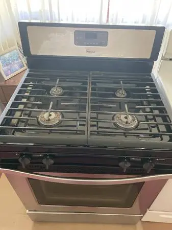 #### WHIRLPOOL BLACK STAINLES STOVE  WITH SELF CLEANING ###