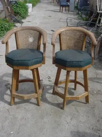 2 oak swivel barstools wicker back
