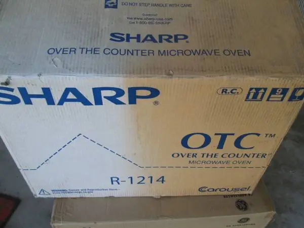 Sharp 24 1.5 CF 1,100 Watt Over the Counter Microwave Stainless Steel