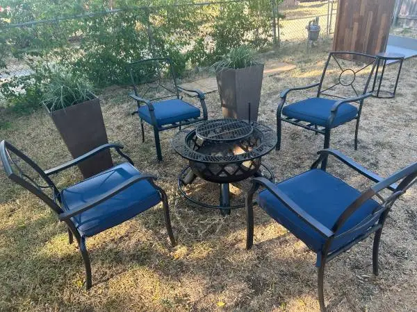 Outdoor patio table set - four chairs fire pit and cushions