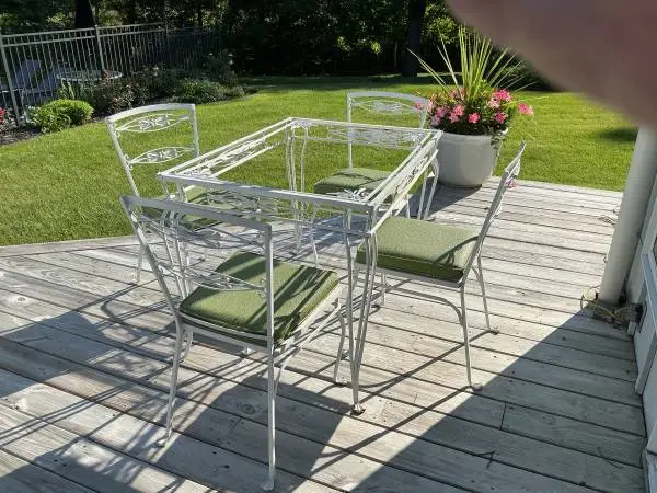 Four seat glass top patio table set