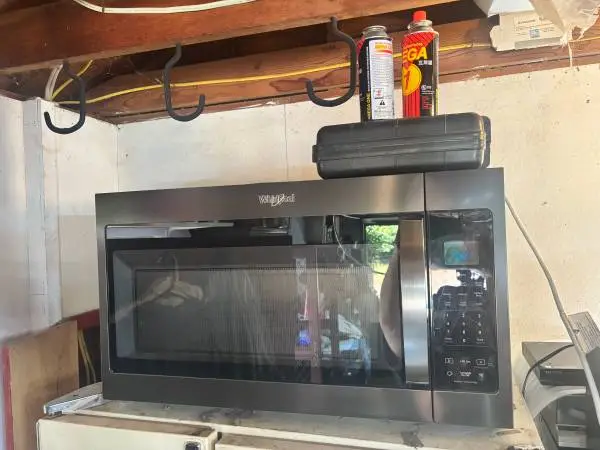 Brand new Whirlpool Over-the-Range Microwave
