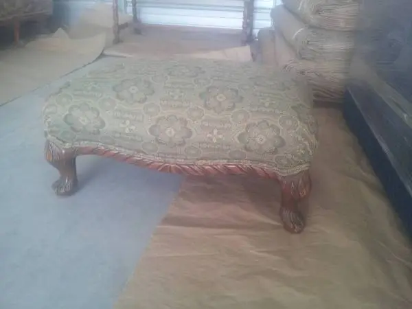 ottoman or footstool not sure of age