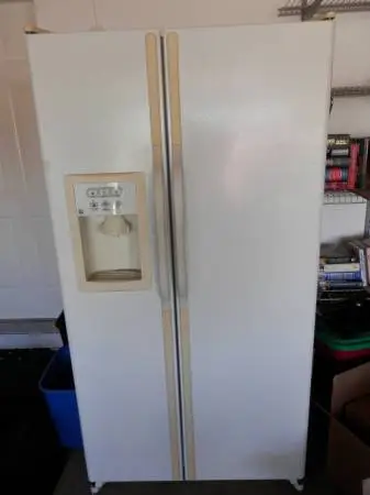 Refrigerator GE 23 cu.ft. side by side...Glass shelves and Icemaker