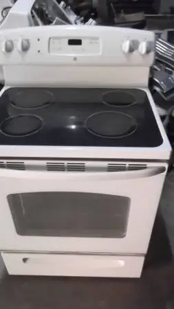 G.E. Glass Top, Stove, Guaranteed 30 days