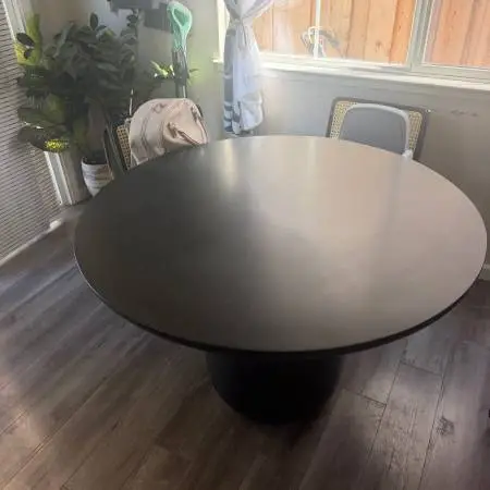 CB2 Lola 45 round black concrete dining table