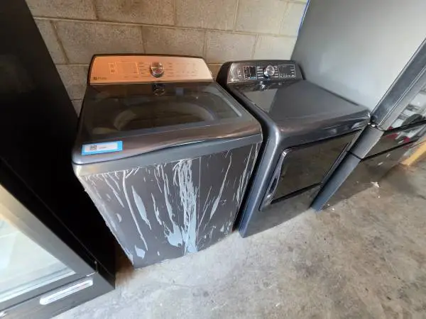 Ge profile 5.4 cu ft new jumbo top load washer and gas dryer