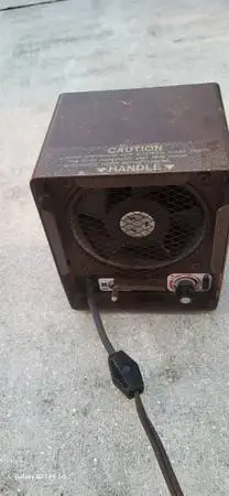 1500W Heater with adjustable thermostat.