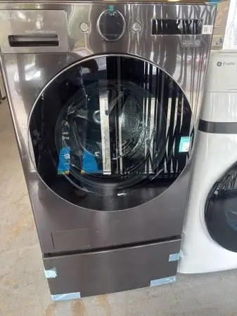 LG 5.0 cu. ft. Mega Capacity Smart Front Load All-in-One Washer Dryer Combo - $1