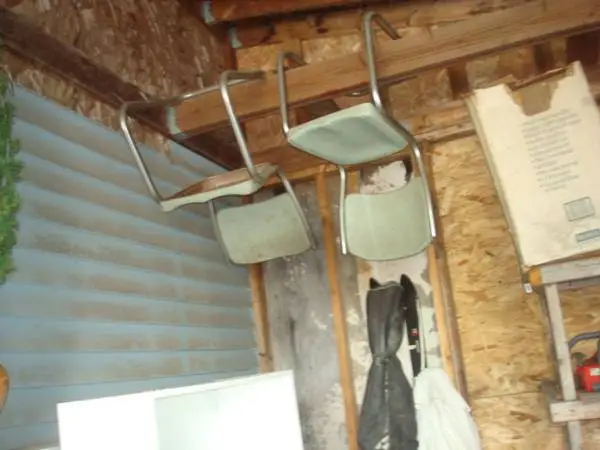 2 blue metal chairs