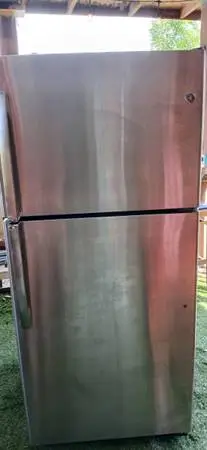 GE Stainless Steel Refrigerator - Good Condition