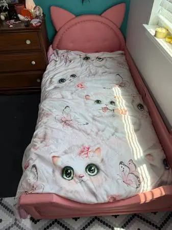 Pink leather cat bed