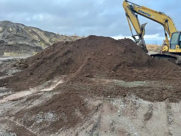Peat, gravel, rocks, riprap, topsoil and safty rail fencing