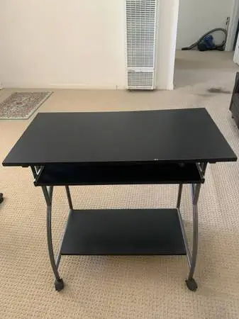 Black rolling desk