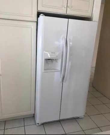 White fridge with ice and water dispenser