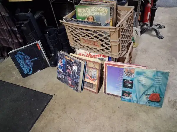 HAVE 2 MILK CRATES FULL OF OLD ALBEMS