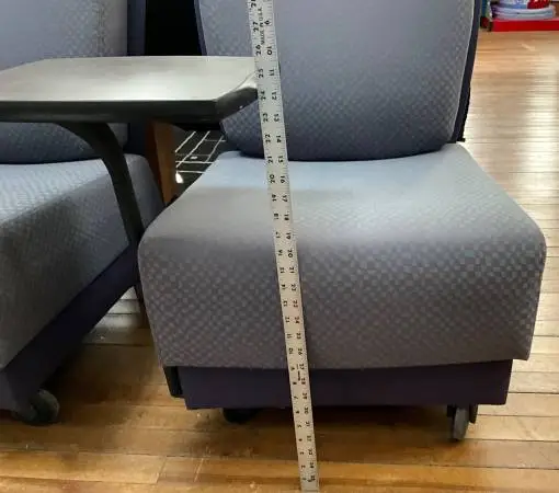 Rolling, upholstered chair w/desk