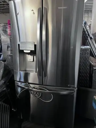 Large STainless Steel Refrigerator by LG.
