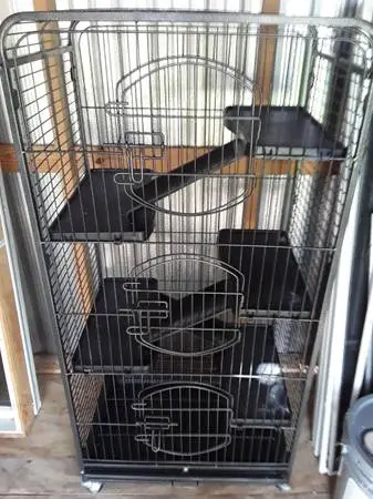 Large cage w wheels and 3 doors