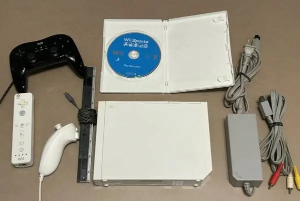 Nintendo Wii System w/ WII SPORTS + TONS OF NES/SNES GAMES!!
