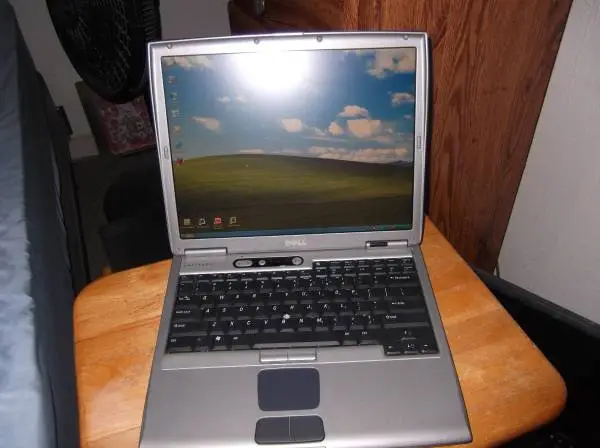 dell latitude laptop, windows xp, works good, serial port,paraell port