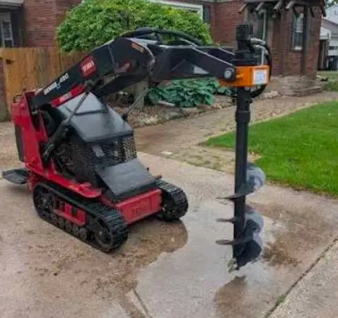 Wolverine post hole auger for mini skidsteer