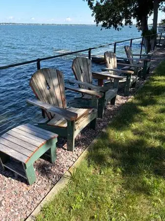 Adirondack chairs with foot rest and side stands