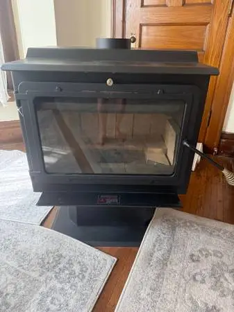 ESTATE SALE-, FREE:  BRAND NEW Wood STOVE , used Beds