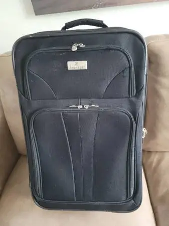 Wheeled suitcase approved for airline carry on