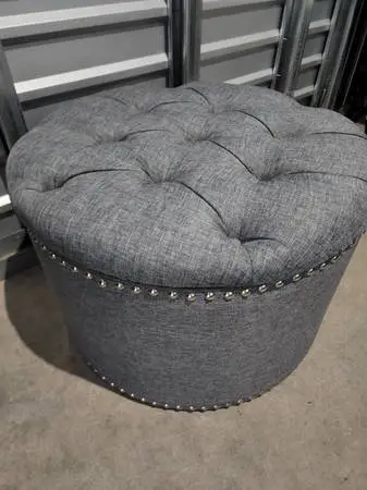 Gray white linen round tufted storage ottoman chrome nailhead trim