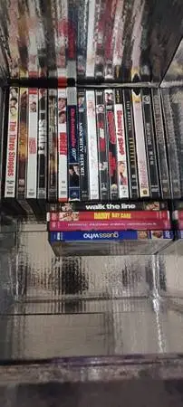(20) DVDs MOVIES, AND (9) BENNY HILL VHS