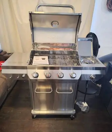 New. NexGrill 4 +1 Burner Stainless Steel Propane Gas Grill.