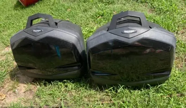 Triumph hard shell side panniers in perfect condition.