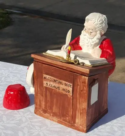 Antique porcelain Santa theme cookie jar