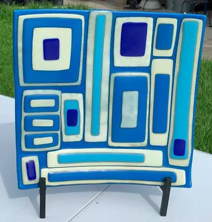 A large square Ceramic Tile with Abstract painting of blocks