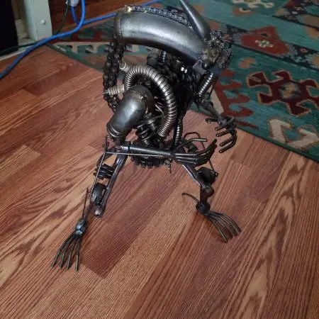 Rod Man Metal Sculpture.  This is available.