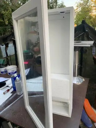 Medicine cabinet mirror..........H 50