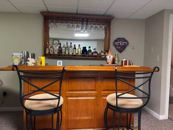 Large home 2 piece oak (type) bar with stools and wall mount