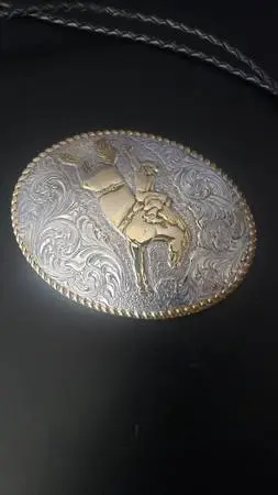 Belt buckle bolo tie