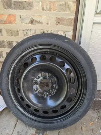 New Chevy Malibu Spare Tire Good Year T125/70 60 psi