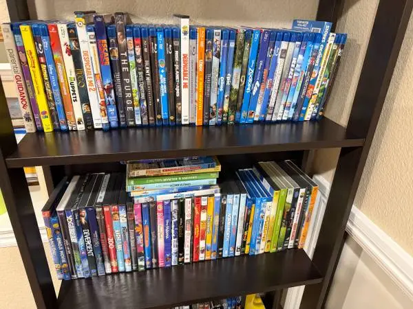 About 100 Kid/family friendly DVD/BluRay disks in original packaging