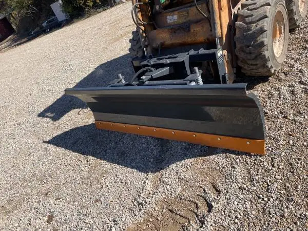 Skid steer snow plow