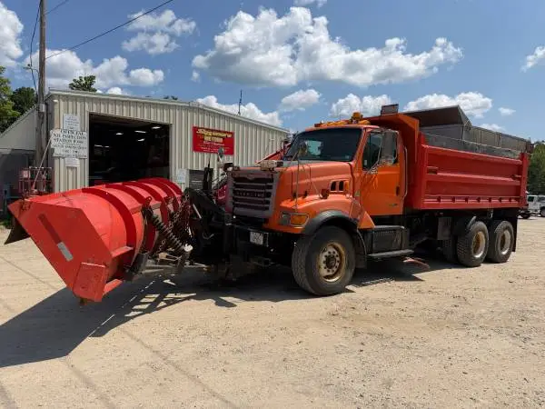 2003 Sterling LT9500 dump truck with plow wing and sander