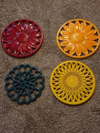 Enamel cast iron sunflower trivets/wall hanging x4