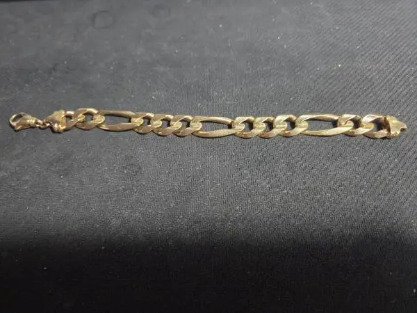 Figaro Bracelet 14K  60.88 Grams