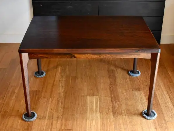 Restored Brazilian Rosewood expandable rectangular dining table