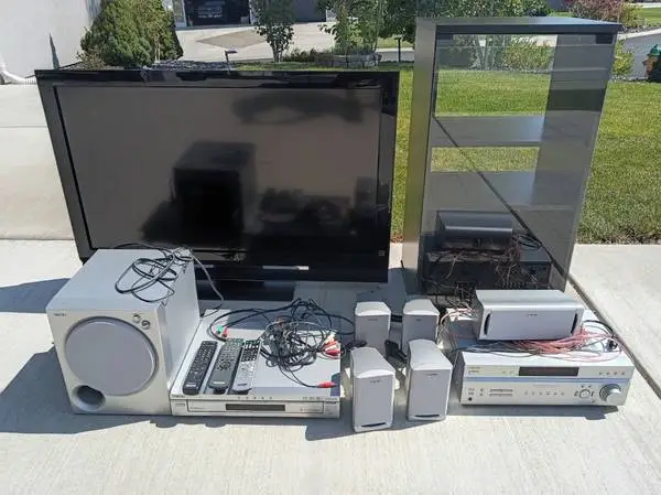 TV - Speaker Surround Sound System - DVD - Tuner and storage shelf